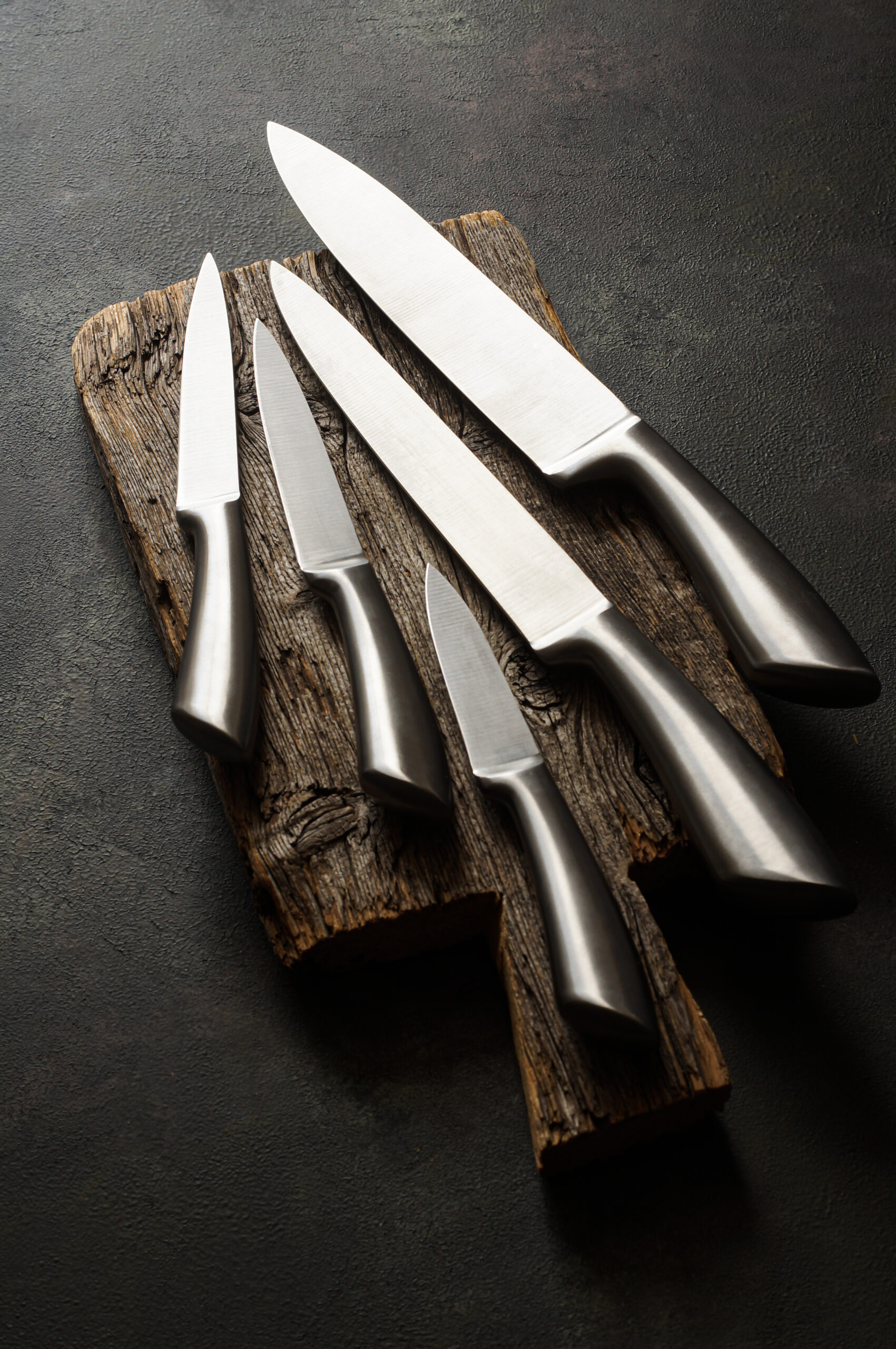 Casting steel various chef knife, Set of modern sharp kitchen knives on dark background
